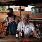 Patrons at the West Alabama Ice House in Houston have beers before Texas Governor Greg Abbott's order that all bars are to be closed amid a surge in coronavirus cases