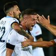 Lazio's Serbian midfielder Sergej Milinkovic-Savic (2ndL) celebrates after scoring against Atalanta in Bergamo.