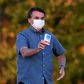 Brazilian President Jair Bolsonaro, seen here showing off a box of hydroxychloroquine to supporters outside presidential palace in Brasilia said nearly everyone will probably get the coronavirus, just like he did