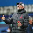 Jurgen Klopp gestures on the touchline during Liverpool's match against Everton