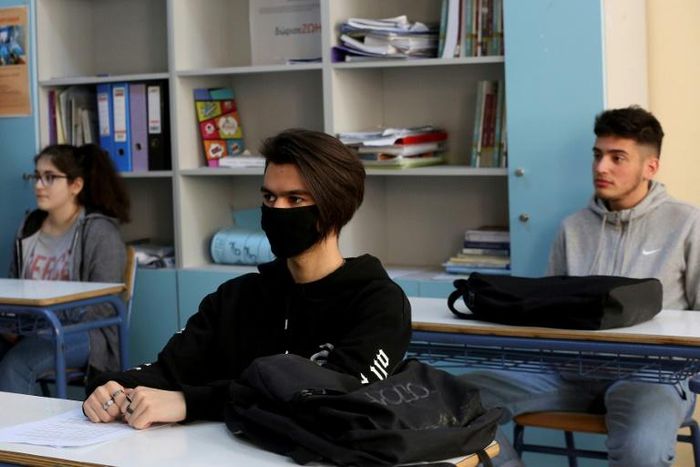 Some students in Athens wore masks in class. Greece reopened high schools for final-year pupils, with a reduced number of students per classroom