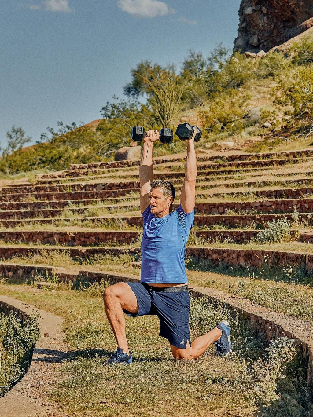 step 3 of man doing a half kneeling reverse lunge from sling subsystems