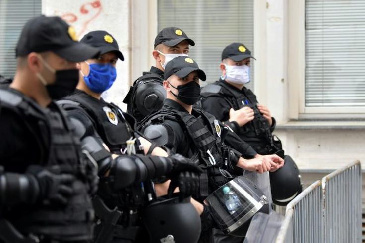 The marchers rallied despite a ban on public gatherings during the coronavirus pandemic, singing songs linked to the anti-Nazi struggle