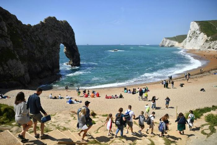 With many Britons looking to stay at home this year in the wake of the coronavirus media and travel firms have been talking up the merits of domestic destinations such as Durdle Door near West Lulworth on the south coast