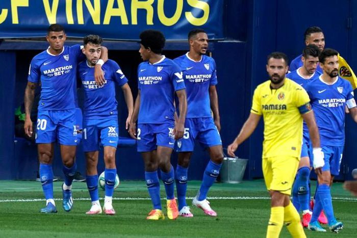 Sevilla forward Munir El Haddadi (2L) ensured the visitors came away with a point at Villarreal