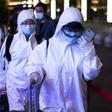 Many passengers wore hazmat suits as they arrived at Wuhan's Wuchang rail station to board some of the first trains to leave the Chinese city in more than two months