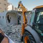 Palestinian owners of homes built without permit in Israeli-annexed east Jerusalem prefer to raze their homes themselves to avoid having to pay thousands of shekels to the city's demolition crews