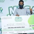 Atose Francis, N1million winner, giving the 9mobile brand a thumb up at the ongoing 9mobile Mega Millions Promo prize presentation in Ibadan.