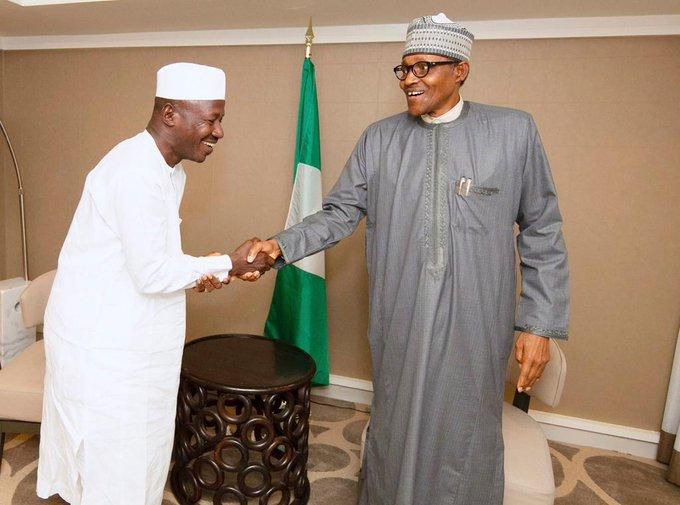 Ibrahim Magu (left) shakes hands with President Muhammadu Buhari (right) [EFCC]