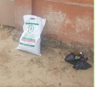 A bag of palliatives found in the school premises when no parent was in sight to receive the food items on behalf of their children. (Pulse)