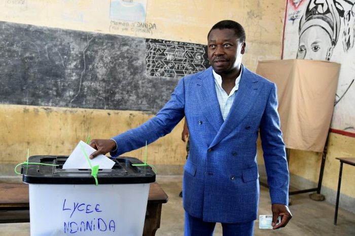 Togo's long-time leader, Faure Gnassingbe, casting his vote in presidential elections in February