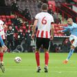 Kyle Walker (right) scored the only goal as Manchester City beat Sheffield United 1-0