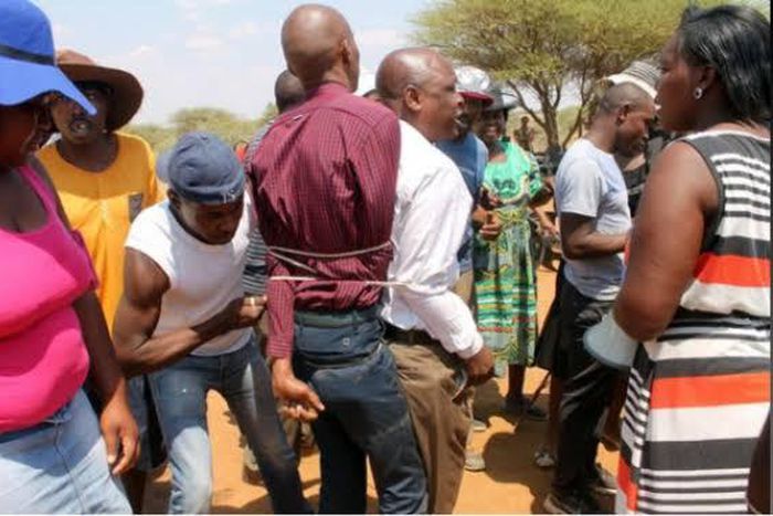 Church members beat up Pastor after wife accused him of using black magic/Illustration. [nairaland]