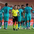 Lionel Messi (R) celebrates with his Barcelona teammates after scoring the final goal in their 4-0 win at Mallorca on Saturday