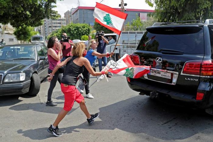 Lebanese protesters make an abortive attempt to disupt a session of parliament at which it backed the emergency powers assumed by the government