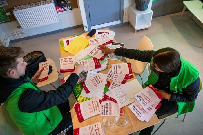 The flyers are in various languages