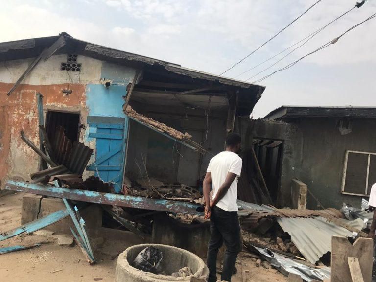A picture of a lone accident by an articulated vehicle which crashed into a building situated at Owode-Onirin of Lagos. [NAN]