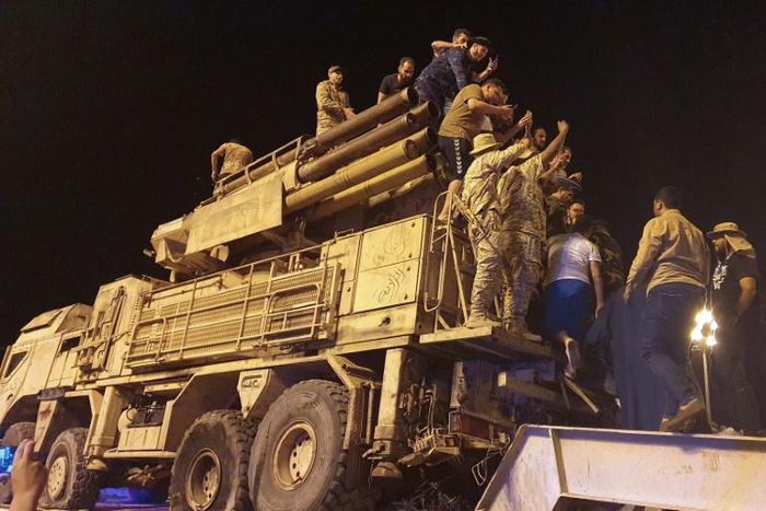 Forces loyal to Libya's UN-recognized Government of National Accord parade a Pantsir air defense system truck in the capital Tripoli on May 20, 2020 after its capture at a nearby airbase from strongman Khalifa Haftar