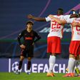 Captain Yussuf Poulsen (R) leads the celebrations after RB Leipzig beat Atletico Madrid 2-1 on Thursday to reach the semi-finals of the Champions League.