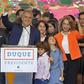 Colombian President Ivan Duque (center) -- seen here celebrating his election victory in June 2018 alongside his family -- is now under investigation for alleged campaign finance violations
