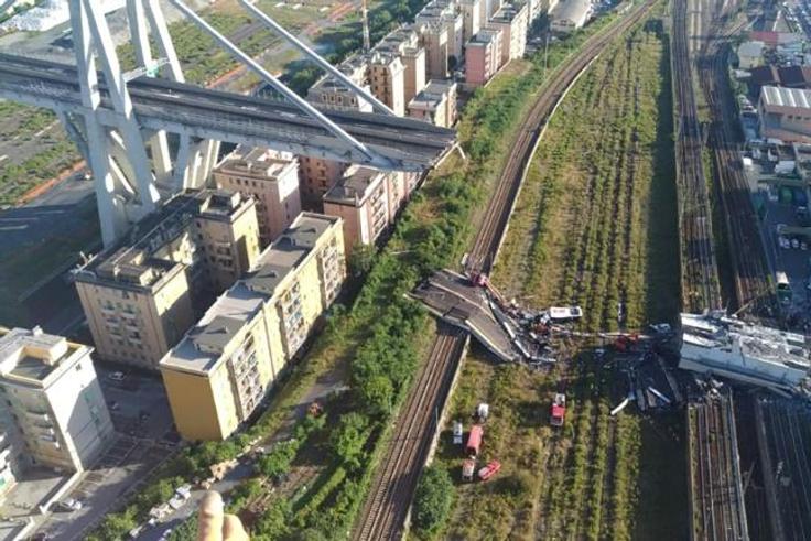 Dozens of cars and several trucks crashed onto railway tracks when the Morandi motorway bridge collapsed in August 2018 killing 43 people