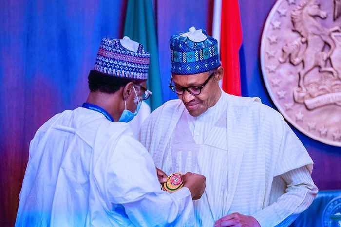 President Muhammadu Buhari inaugurates 2021 Armed Forces Remembrance Emblem. [Twitter/@BashirAhmaad]