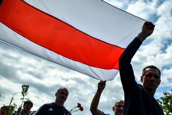 Belarus opposition supporters joined a funeral ceremony for a protester who died on on Monday
