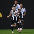 Udinese's Macedonian forward Ilija Nestorovski (L) celebrates after scoring against Juventus.