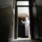 A man disinfects a building in Algiers on March 20