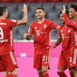 Bayern Munich players celebrate after scoring in their 8-0 rout of Schalke in their Bundesliga season opener