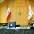 Iranian Parliament speaker Mohammad-Bagher Ghalibaf (C) chairing a parliament session in the capital Tehran