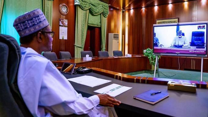 President Muhammadu Buhari receiving updates from the Presidential Task Force on Coronavirus va teleconferencing. [Twitter/@BashirAhmaad]