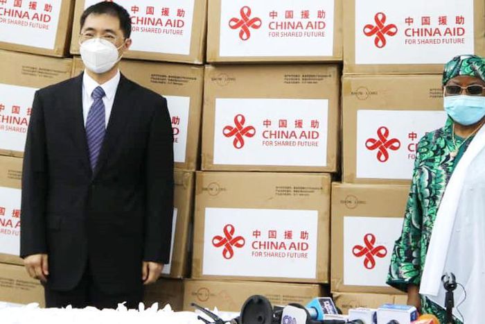 Mr Show Yong, Dep. Amb of the Chinese Embassy in Abuja and Hajiya Hajo Sani, representative of First Lady, Aisha Buhari receiving the equipment. [Twitter/@china_emb_ng]