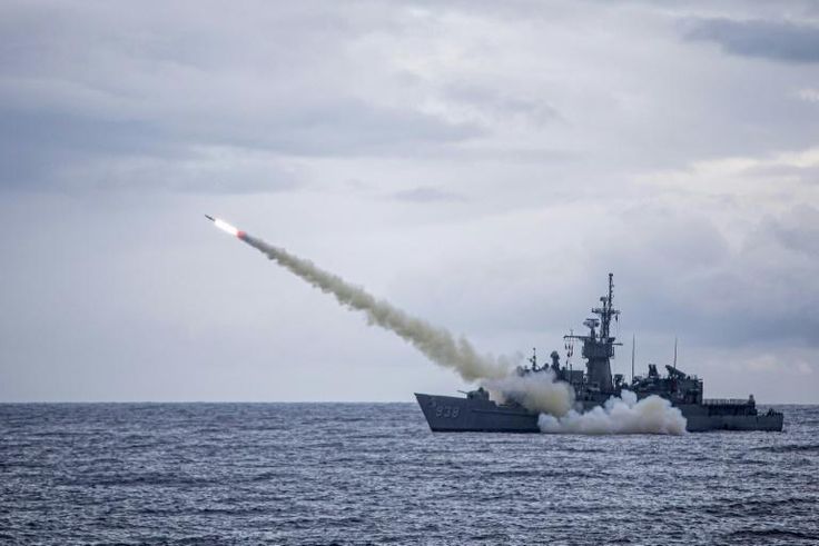 A warship launches a US-made Harpoon missile during the annual drill