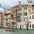Gondoliers in Venice practise on the Grand Canal as they wait for tourists to return to the city