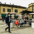 Codogno residents have a drink at a cafe terrace as Italy eases its lockdown aimed at curbing the spread of coronavirus