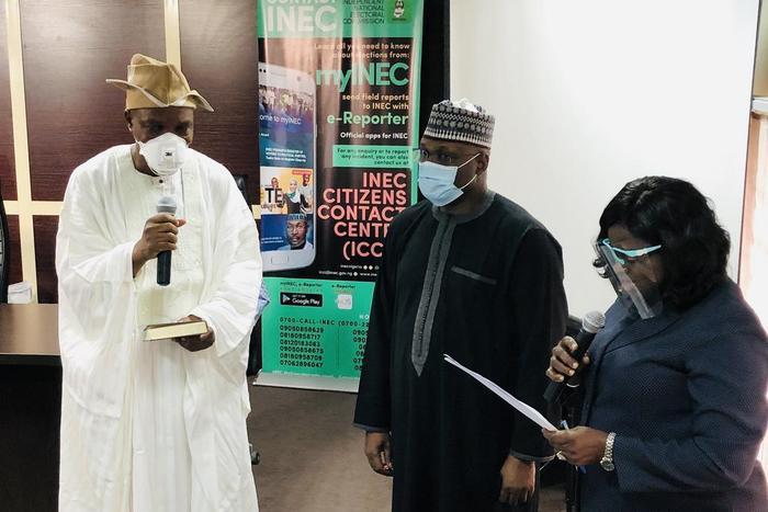 INEC swears-in Dr. Tella Rahmon as a Resident Electoral Commissioner for Ekiti state. [Twitter/@inecnigeria]