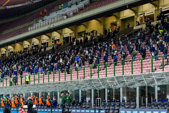 Socially distanced spectators attend the Serie A match between Inter Milan and Fiorentina in the San Siro