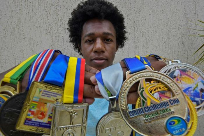 Brazilian gymnast Angelo Assumpcao believes his career was derailed after he spoke out against the racism he was subjected to by his white teammates