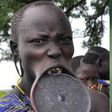 Why girls of the Mursi tribe must remove their teeth and stretch their lips before they marry