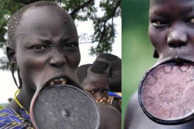 Why girls of the Mursi tribe must remove their teeth and stretch their lips before they marry