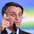 Brazilian President Jair Bolsonaro lashed out again at journalists Monday, a day after threatening to punch a reporter who questioned him about corruption accusations involving the first lady