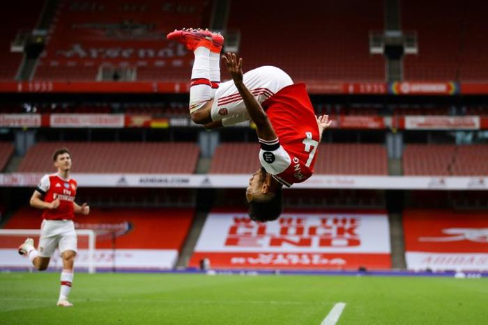 Head over heels: Pierre-Emerick Aubameyang scored twice against Norwich