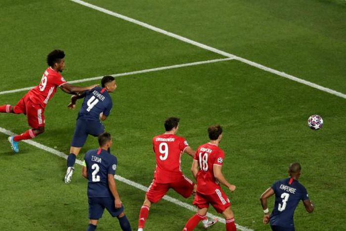 Kingsley Coman (L) heads in the winning goal for Bayern Munich in the Champions League final