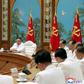 North Korean leader Kim Jong Un convened an emergency politburo meeting on Saturday to implement a "maximum emergency system and issue a top-class alert" to contain the virus, official news agency KCNA said