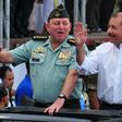 Under US sanctions: Nicaraguan President Daniel Ortega (R) and Army General Julio Cesar Aviles (L), seen in 2012