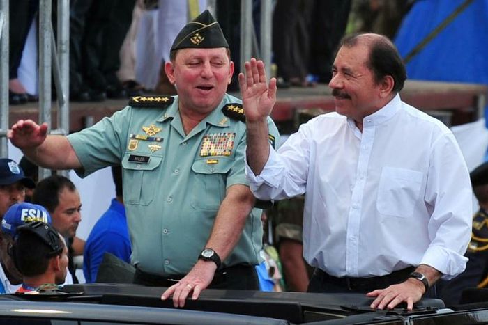 Under US sanctions: Nicaraguan President Daniel Ortega (R) and Army General Julio Cesar Aviles (L), seen in 2012