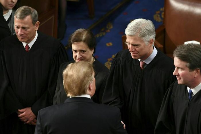 US Supreme Court Justice Neil Gorsuch (2R, pictured February 2019 shaking hands with President Donald Trump) wrote the majority opinion banning employers from firing LGBT workers on the basis of their sexual orientation