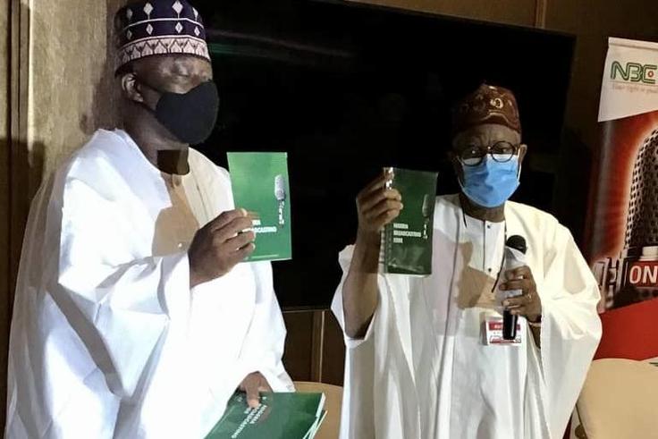 Minister of Information and Culture, Alhaji Lai Mohammed and the Acting Director-General of NBC, Prof. Armstrong Idachaba at the unveiling ceremony of the amended Broadcasting Code in Lagos. [NAN]