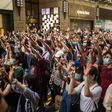 Hong Kong protesters rally against a sweeping new national security law that has prompted some Western nations to offer those from the city refuge